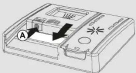 Technical line drawing of a device casing with internal components and directional arrows (no text or symbols)