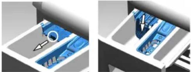 Two 3D diagrams showing a blue mechanical component being inserted into a tray, with arrows indicating direction, no text or symbols present.