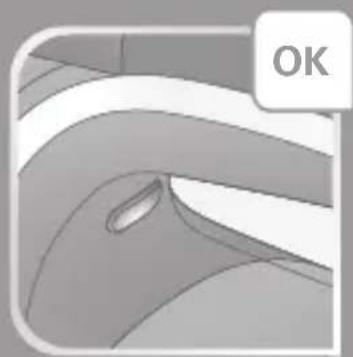Close-up of a curved mechanical component with a small hole, labeled 'OK' in the corner (no other text or symbols)