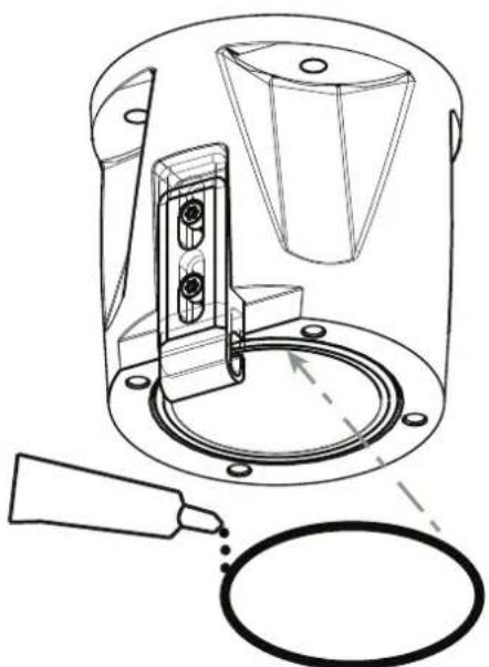 Technical line drawing of a mechanical device with a cylindrical base and internal components, showing no text or symbols.