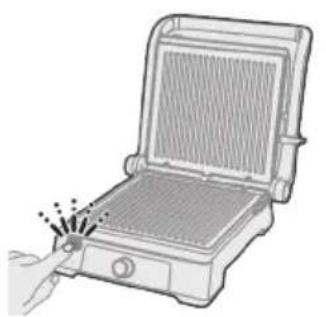 Illustration of a grater with a hand emitting powder from its side panel, no text or symbols.