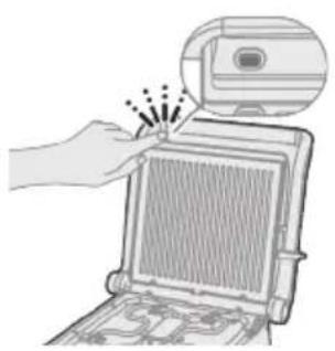 Illustration of a hand opening a laptop with a magnified view showing the screen (no text or symbols).