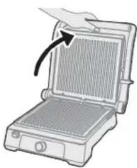 Illustration of a portable kitchen appliance with a hand pointing to the lid area (no text or symbols).