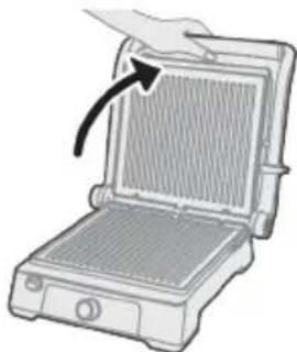 Illustration of a portable kitchen appliance with a hand pointing to the lid area.