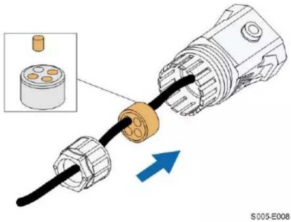 Diagram of a cable connector with a cylindrical component inserted, showing an arrow indicating direction (no text or symbols present)