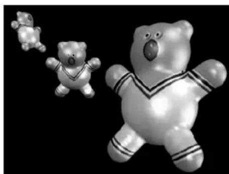 Three toy bear figurines in different poses against a black background (no text or symbols)