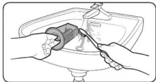 Illustration of hands using a tool to clean or repair a sink (no text or symbols visible).
