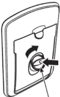 Diagram of a door handle with a rotating button and directional arrows indicating rotation (no text or symbols)