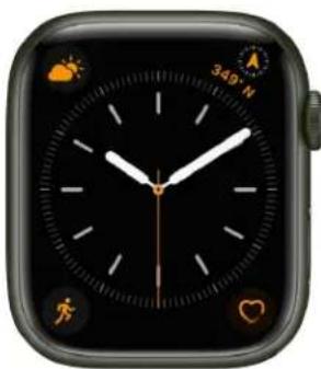 Smartwatch face with black analog clock and orange sun/night icons (no readable text or symbols)