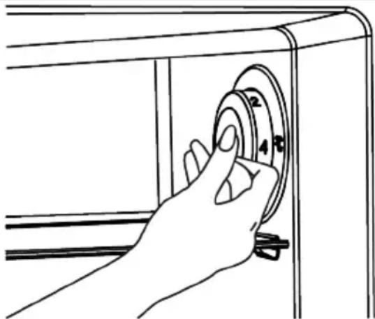Line drawing of a hand pressing down on a wall-mounted device with a rotary dial (no text or symbols)