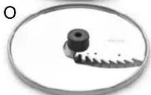Close-up of a mechanical component with a circular frame and textured surface (no visible text or symbols)