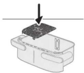 Diagram showing a device with a black arrow pointing to a component on top, no text or symbols present