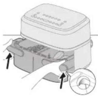 Illustration of a device with arrows indicating process, showing internal components and a magnified inset (no text or symbols)