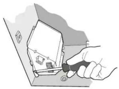 Illustration of a hand using a tool to adjust or install electronic components on a device (no text or symbols visible)