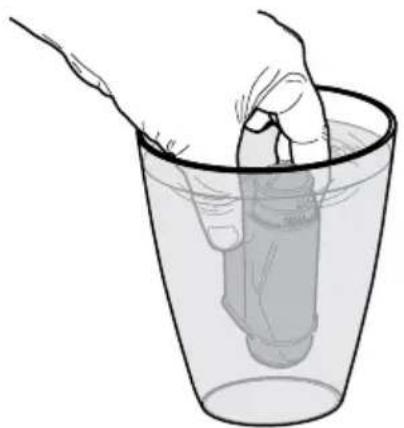 Illustration of a hand pouring liquid into a glass with a submerged object (no text or symbols)