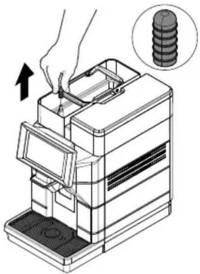 Illustration of a hand using a multi-compartment drawer to install a stack of stacked objects, with an inset showing the same object (no text or symbols present)