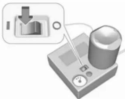 Illustration of a mechanical device with a magnified inset showing a download icon (no text or symbols)