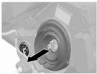 Close-up of a mechanical component with a black arrow pointing to a circular component (no visible text or symbols)