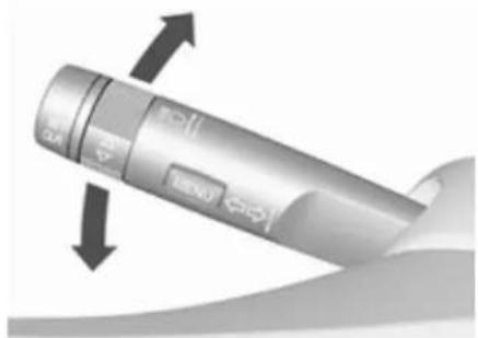 Close-up of a cylindrical device with directional arrows indicating movement or force (no text or symbols visible)