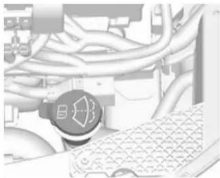Close-up of industrial piping and a computer keyboard with a speaker icon (no readable text or symbols)