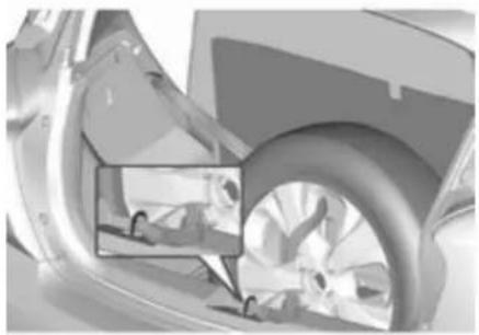 Close-up of a mechanical component with a highlighted inset showing a close-up view of a fan or blade (no text or symbols visible)