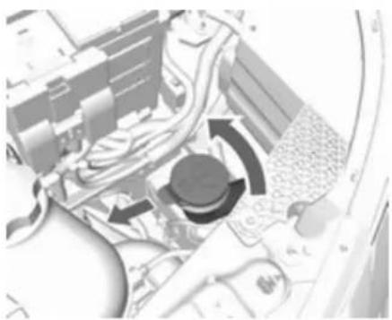 Interior view of a vehicle showing steering wheel, dashboard, and gear mechanism (no visible text or symbols)