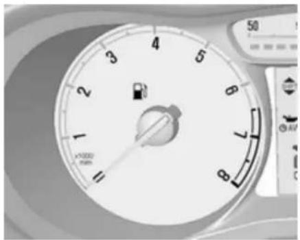 Close-up of a car dashboard dial with a rotary knob and scale (no visible text or symbols)