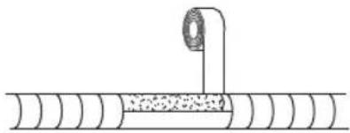Simple line drawing of a pipe inserted into a cylindrical container with granular material inside (no text or symbols)