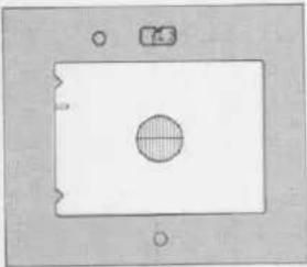 Schéma simple avec un cercle central et deux petits cercles au-dessus, sans texte ni symbole.