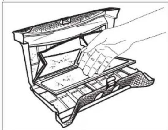 Line drawing of a hand placing a tray into an open device (no text or symbols).