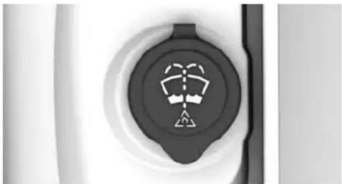 Close-up of a circular mechanical component with a central symbol (no text or labels visible)