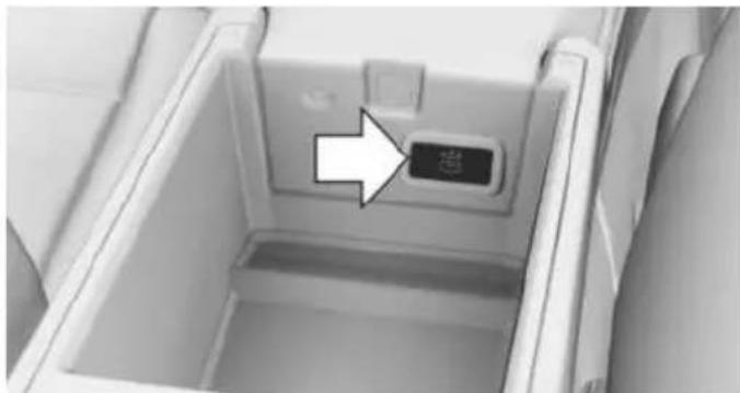Interior view of a refrigerator with a highlighted button and arrow pointing to the interior (no text or symbols visible)