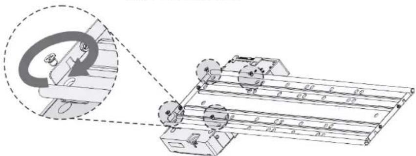 Mechanical assembly diagram showing a rotating component and a linear conveyor system (no text or symbols)