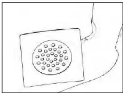 Simple line drawing of a square object with a circular pattern on top, connected to a curved line (no text or symbols)