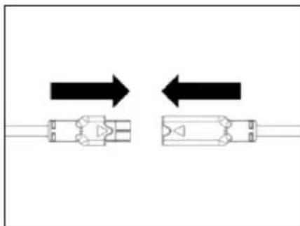 Diagram showing two connected electrical connectors with bidirectional arrows indicating direction (no text or symbols)