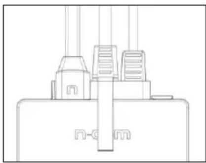 Line drawing of a mechanical device with three components and a base labeled 'n-cm' (no text or symbols beyond label)
