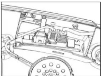 Technical line drawing of a vehicle interior showing engine, wheels, and structural components (no text or labels)