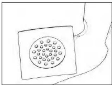 Simple line drawing of a square object with a circular pattern on top, connected to a curved line (no text or symbols)