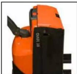 Close-up of an orange and black industrial machine component (no visible text or symbols)
