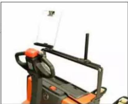 Close-up of an orange and black industrial pallet jack with control lever and antenna (no visible text or symbols)