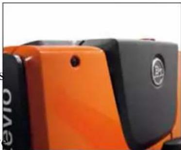 Close-up of an orange and black motorcycle body (no visible text or symbols)