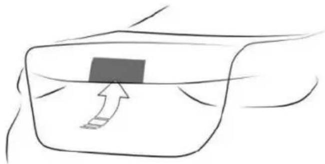 Simple line drawing of a rectangular object with an arrow pointing to it, no text or symbols present.