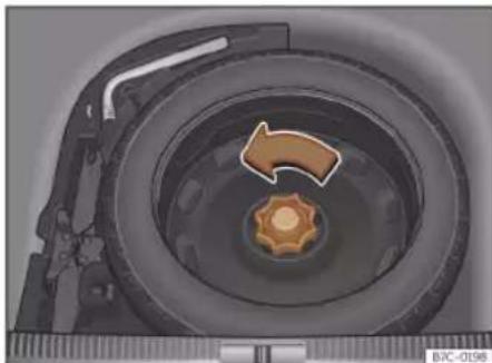 Close-up illustration of a mechanical component with a circular arrow indicating rotation or movement (no text or symbols)