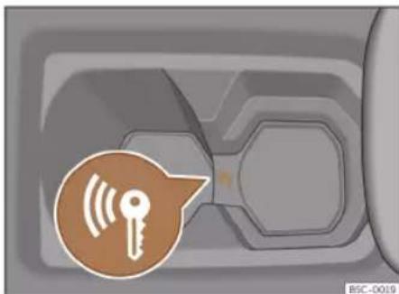 Close-up of a car key icon with signal waves inside, no text or symbols present