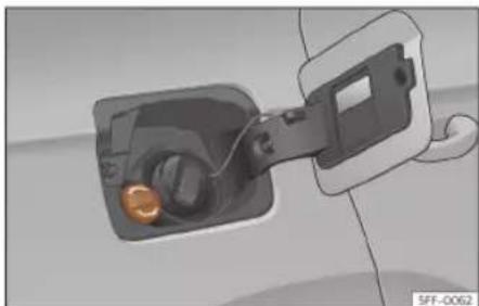Illustration of a car charging plug with a battery, showing internal components and wiring (no text or symbols)
