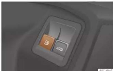 Close-up of a car interior corner with a switch and battery icon (no text or symbols visible)