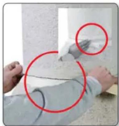Close-up of hands performing a task with two red circles highlighting areas of interest (no text or symbols visible)
