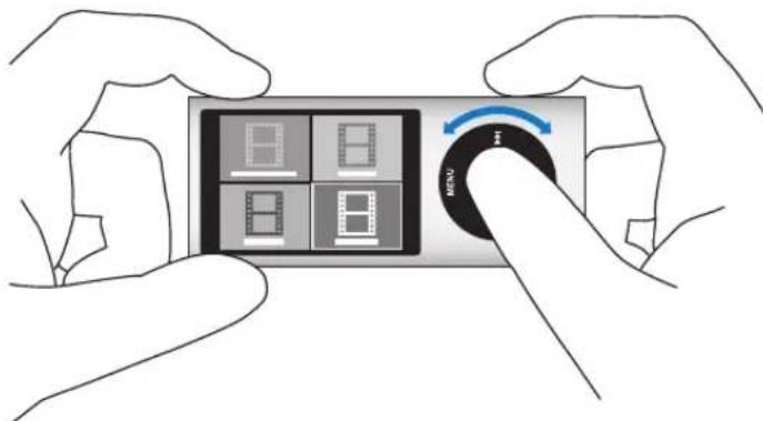 Illustration of hands holding a device with a rotary knob and four square buttons (no text or symbols)