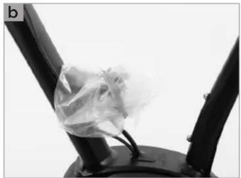 Close-up of a mechanical component with a transparent plastic wrap, no visible text or symbols