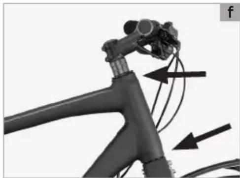 Mechanical component diagram showing a lever mechanism with directional arrows indicating motion (no text or symbols)